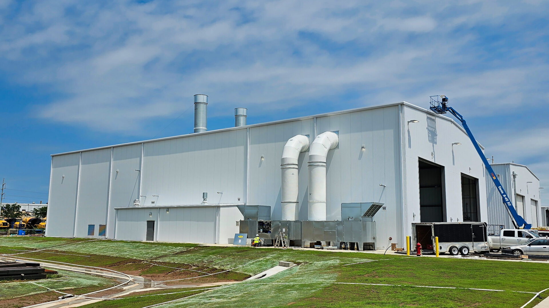 Holt Manufacturing Waco Industrial Paint Blast Booth CAT Commercial Architect San Antonio Heavy Equipment Metal Building