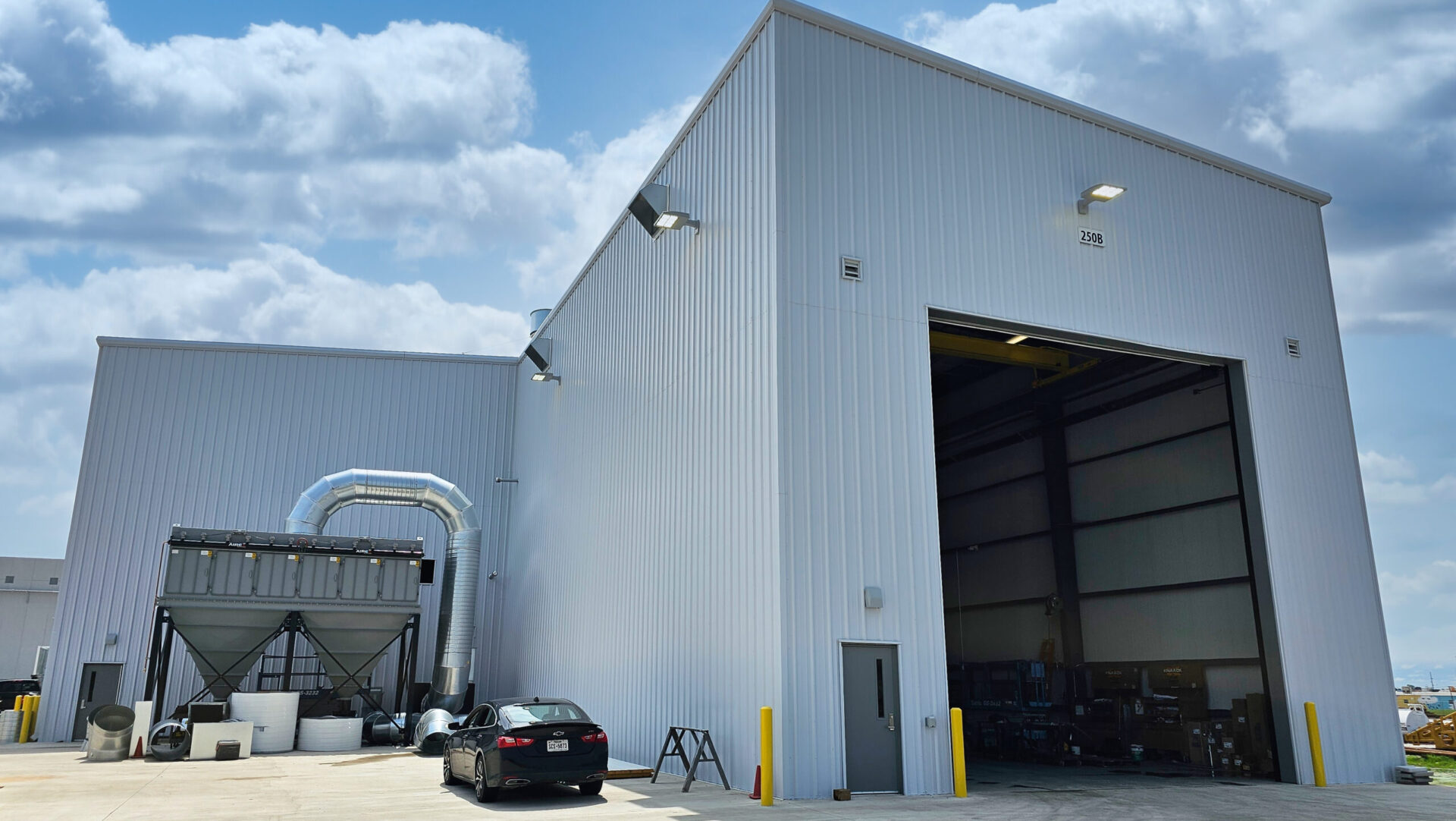 Holt Manufacturing Waco Industrial Paint Blast Booth CAT Commercial Architect San Antonio Heavy Equipment